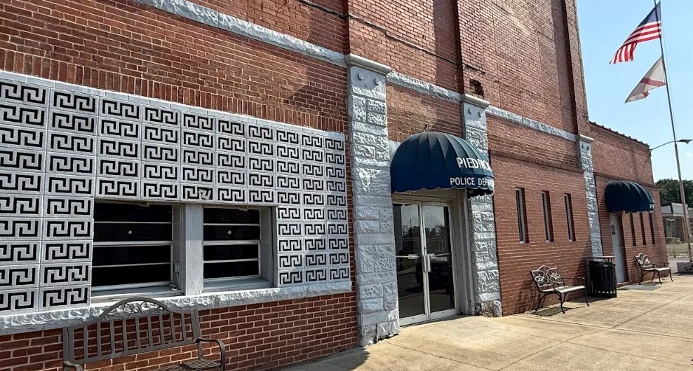 The Piedmont Police Department entrance with blue awnings