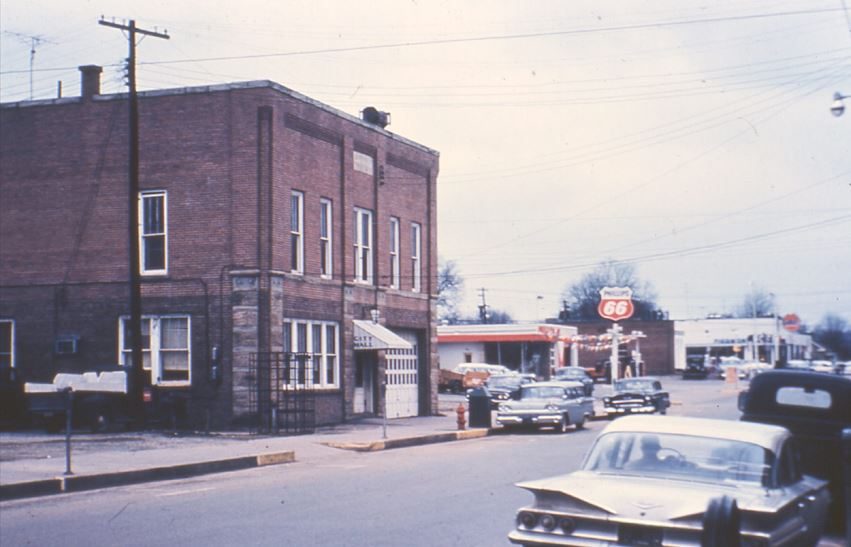 Piedmont City Hall and a Phillips 66 station, mid-century