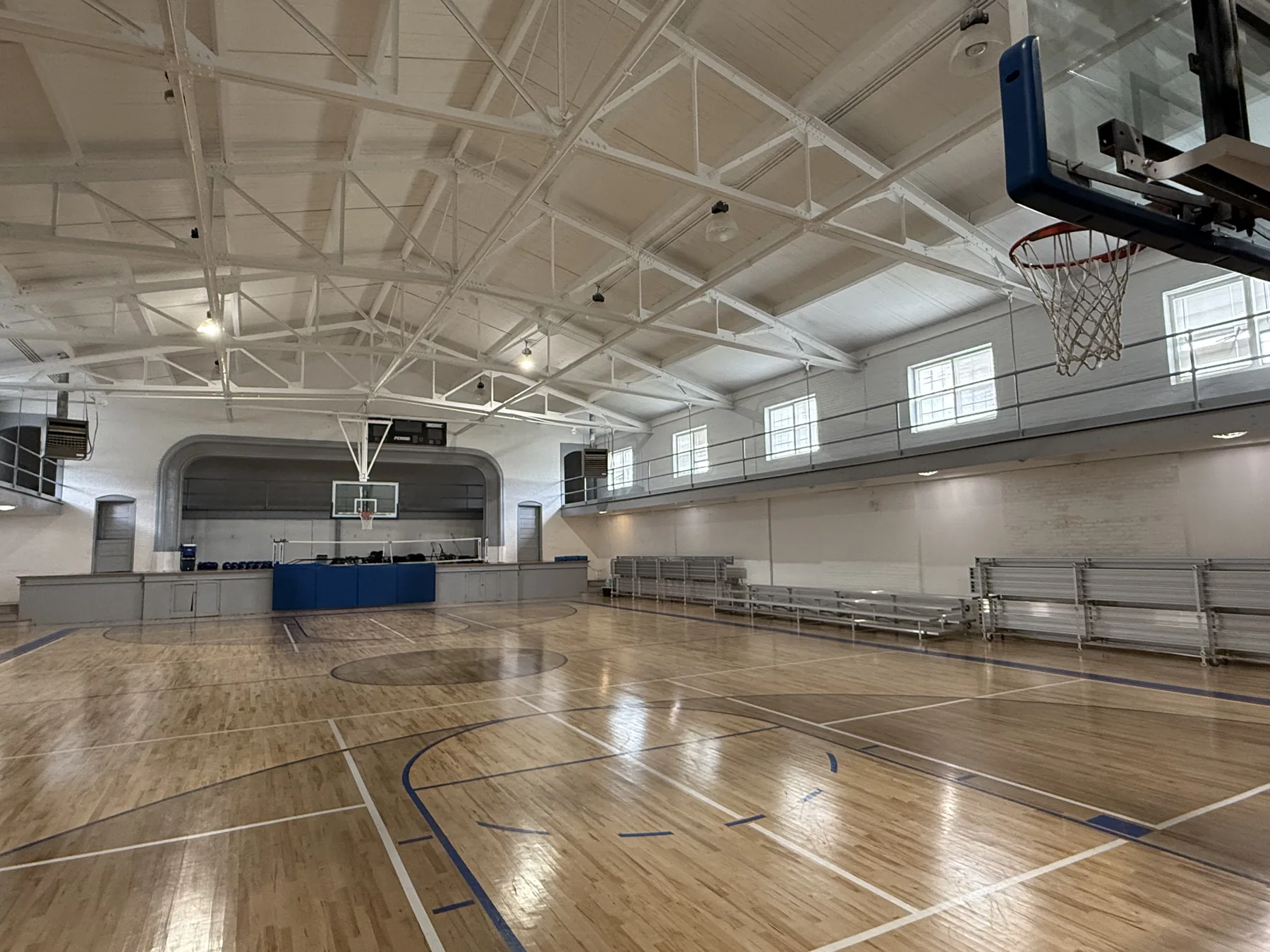 The gymnasium with a wood basketball court at the Civic Center
