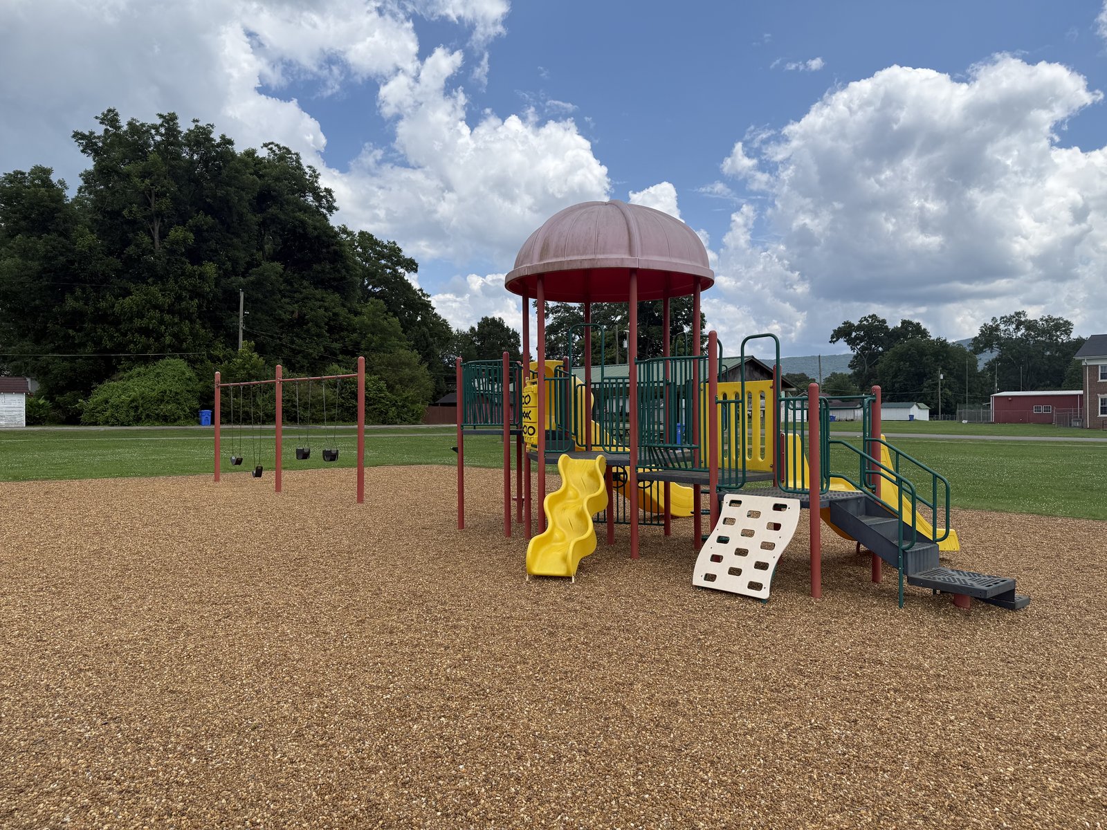The playground at Fagan's Park with a climbing structure and slides
